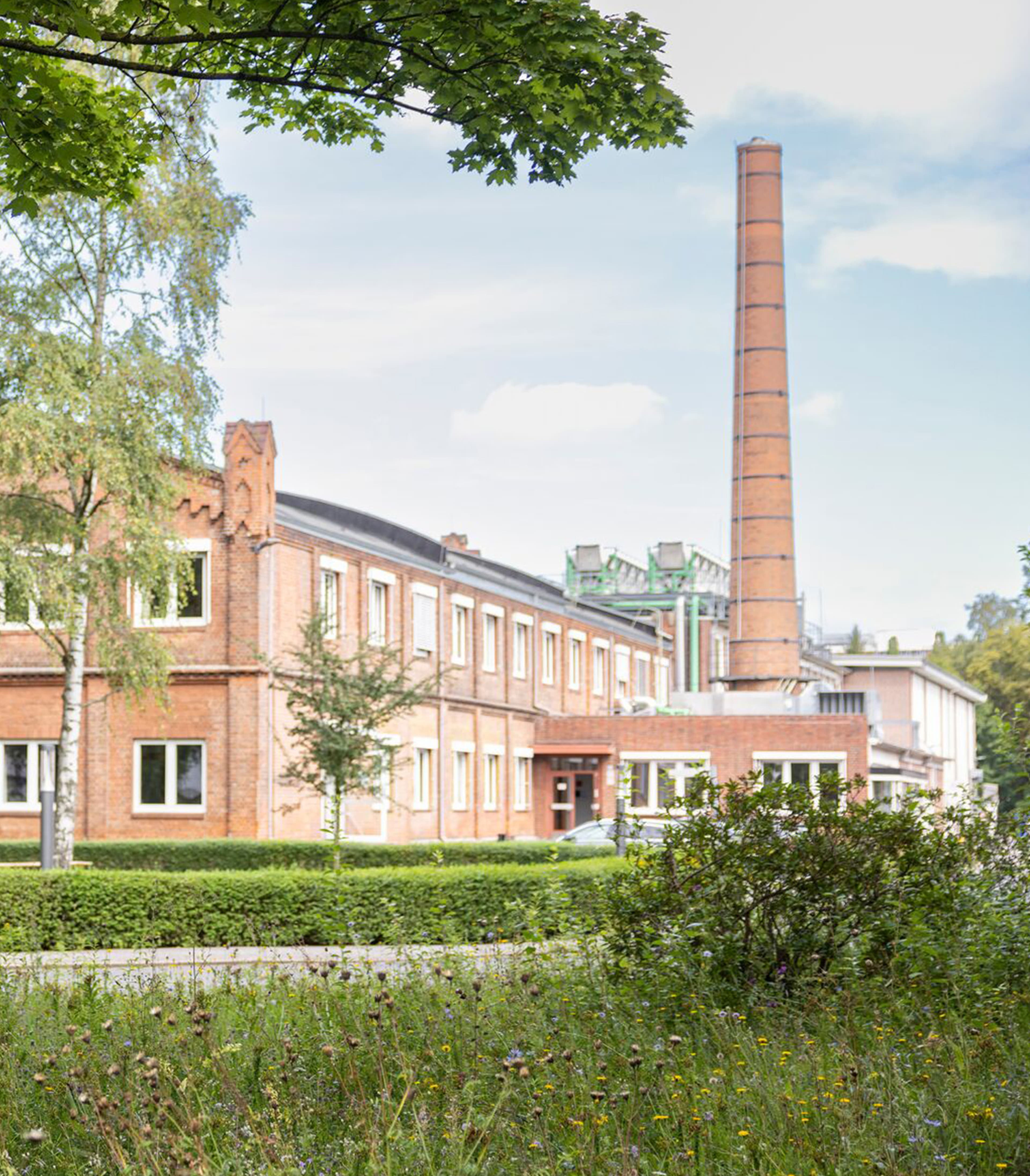 Brick building with a narrow circular tower