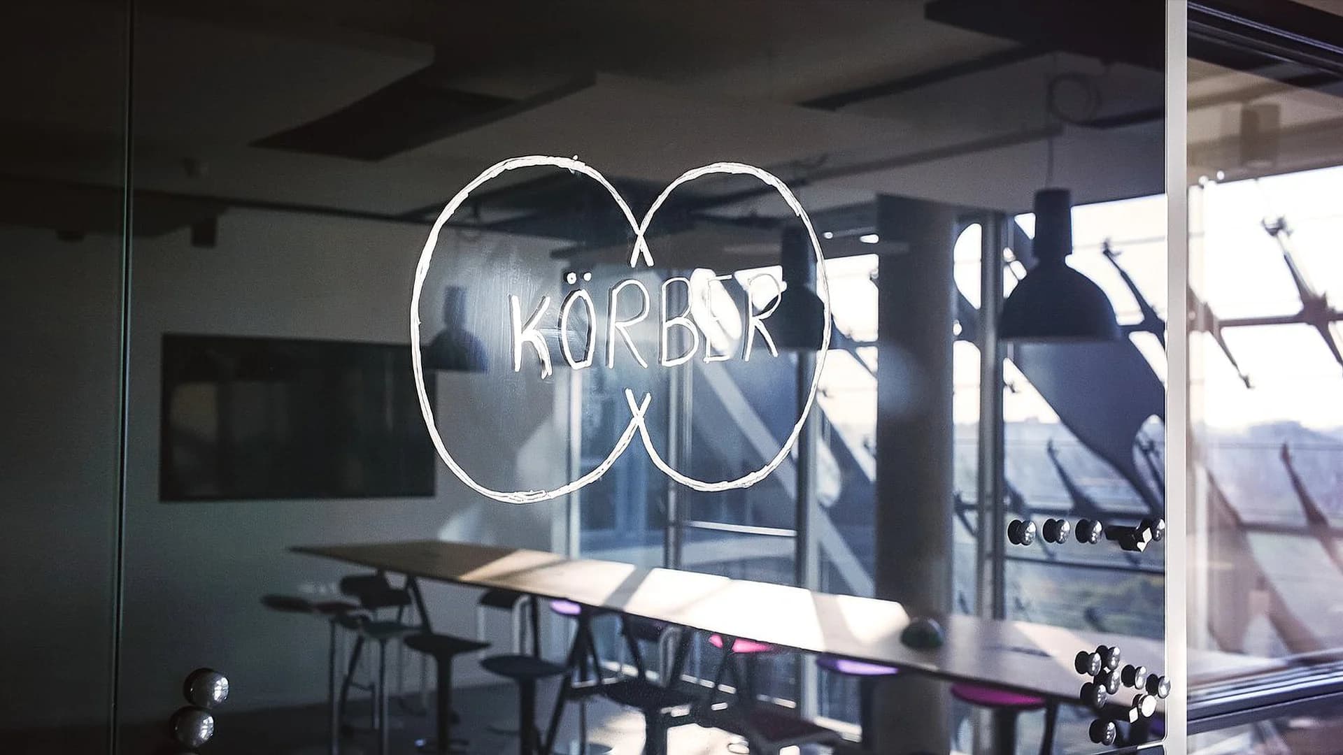 Körber logo drawn on a window