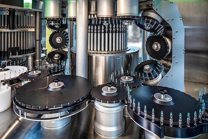 A machine displaying various bottles, showcasing sustainable products and solutions.