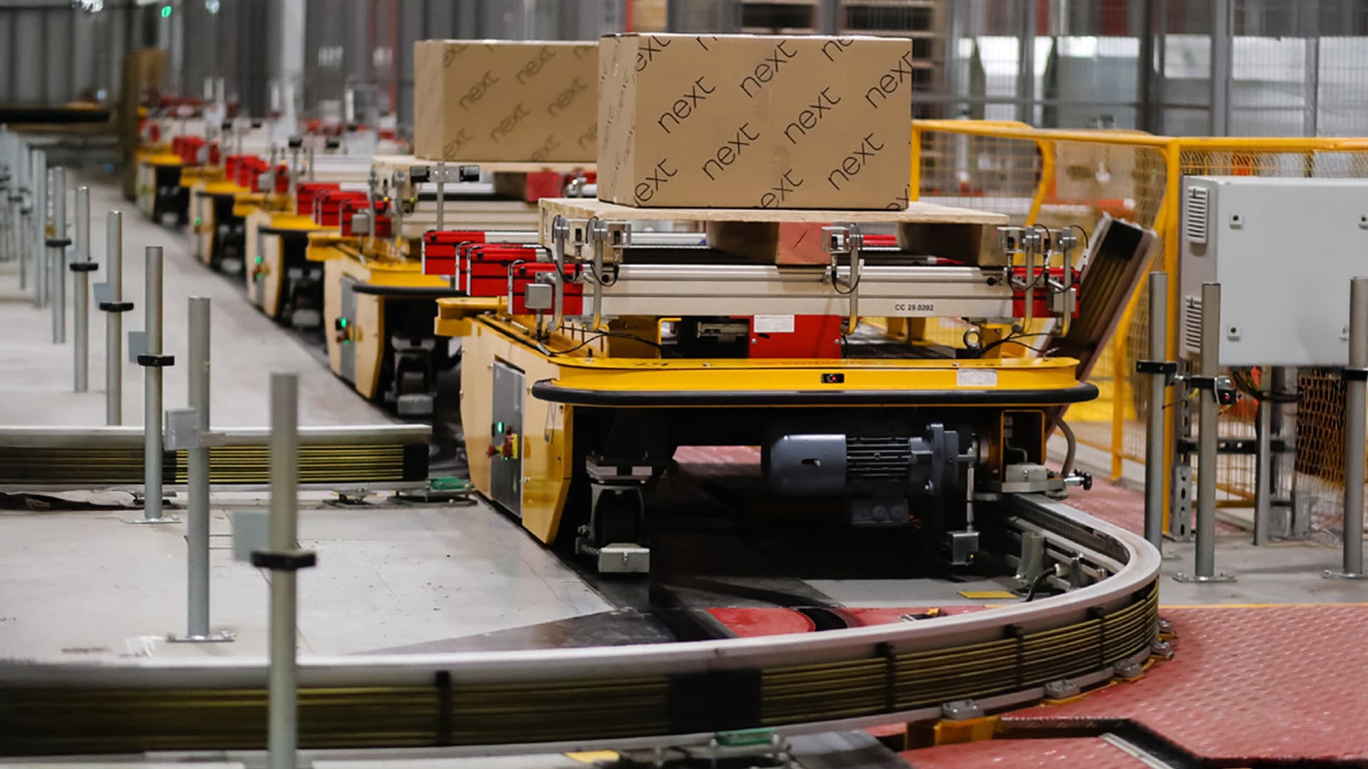 Next retail branded boxes in a warehouse