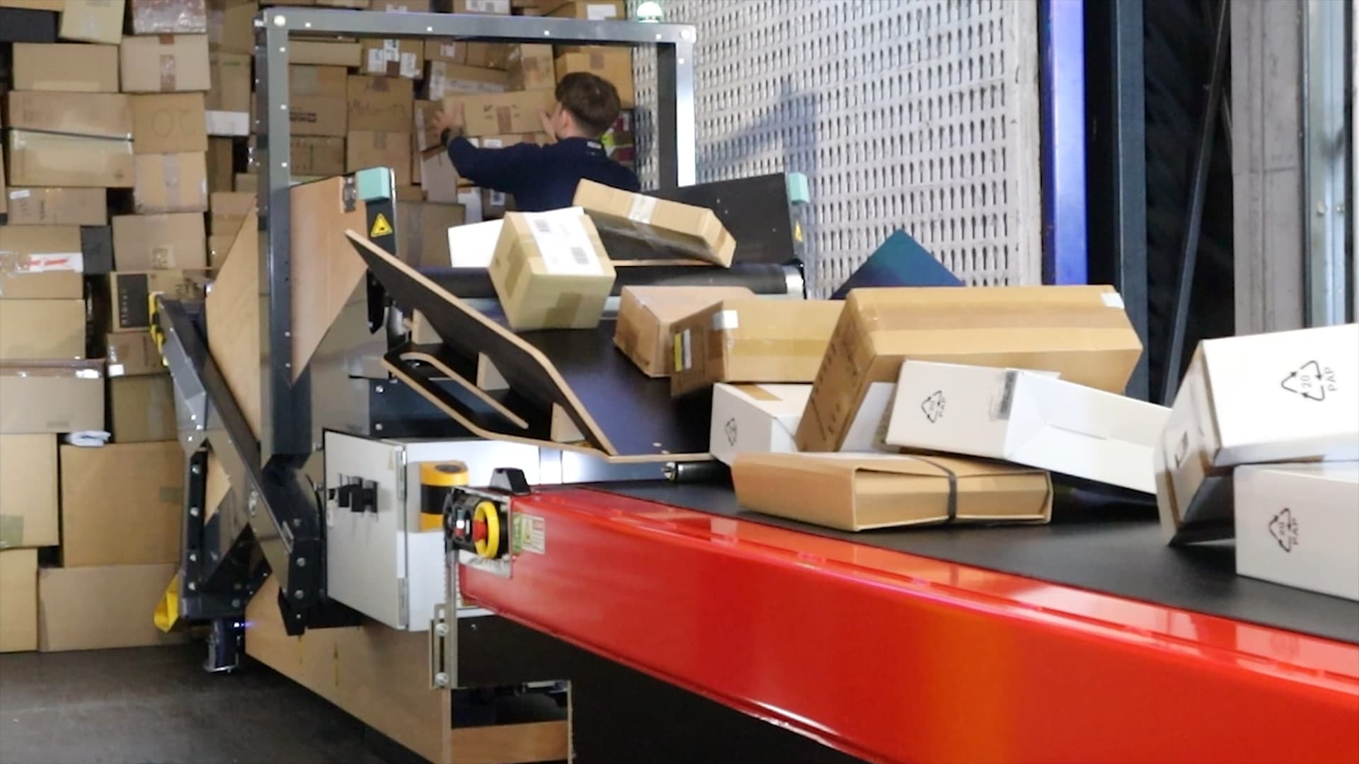 Truck unloader unloading several boxes