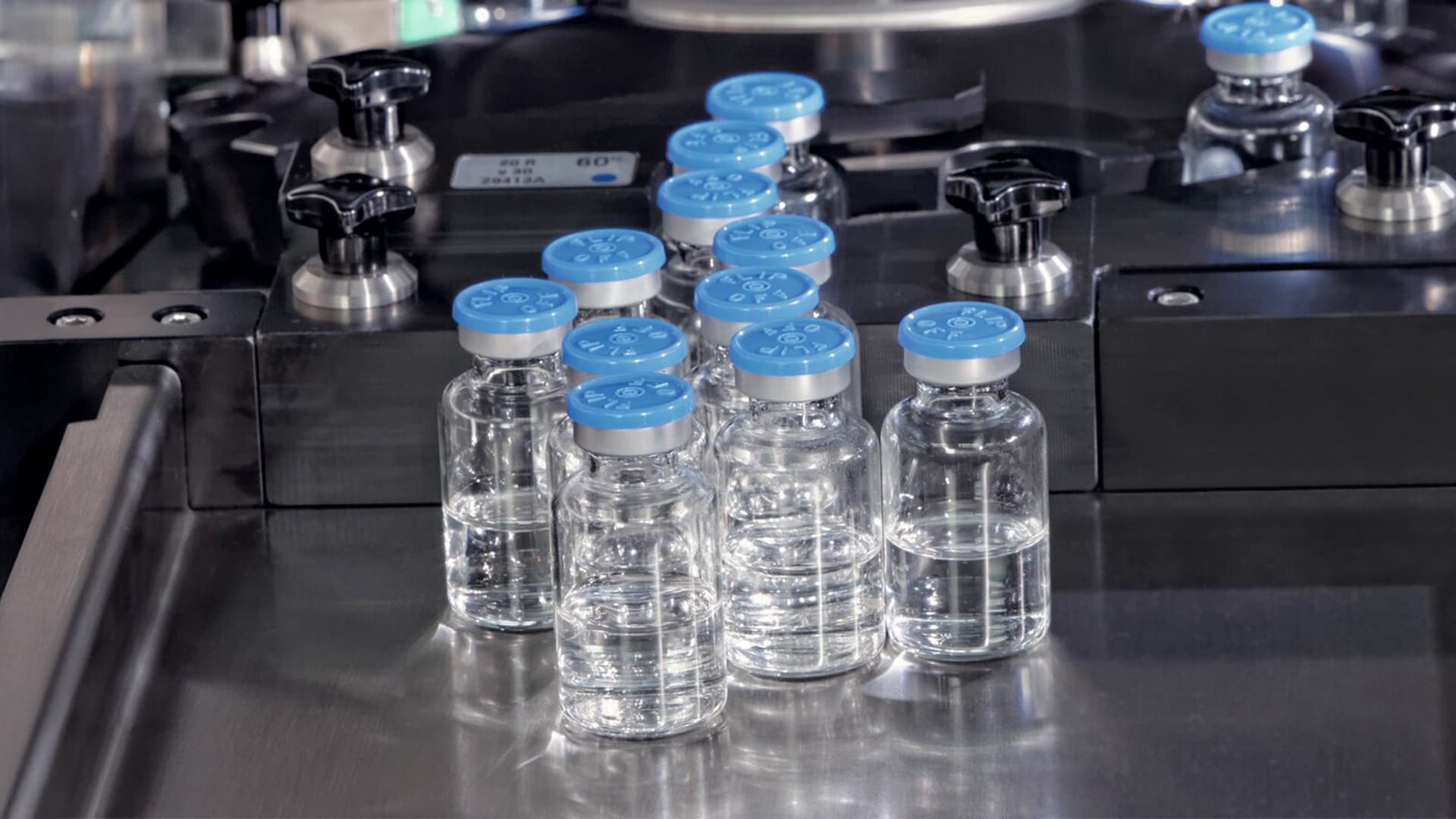 Glass vials on a metal table