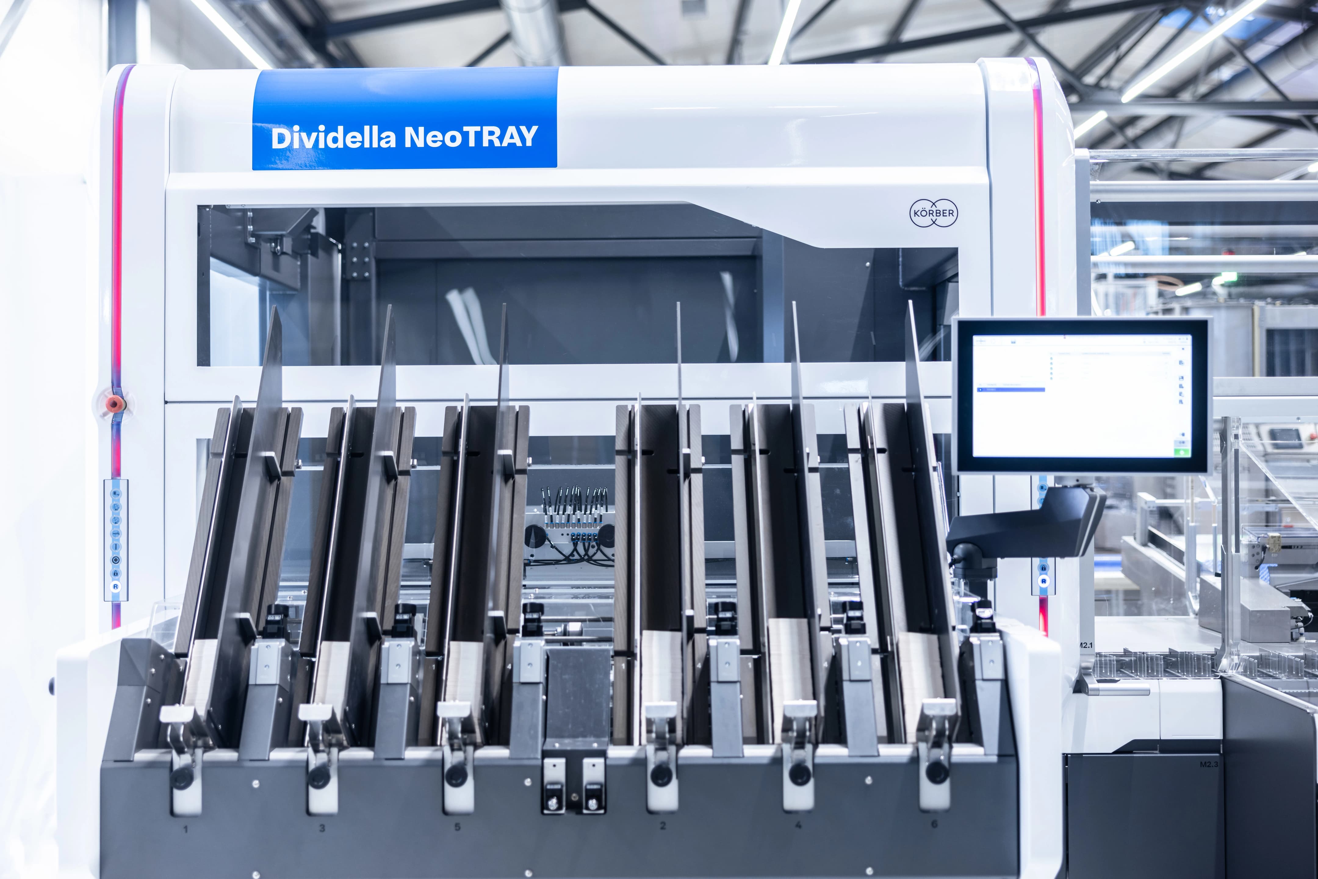 Photograph of Körber's machine Dividella NeoTRAY.