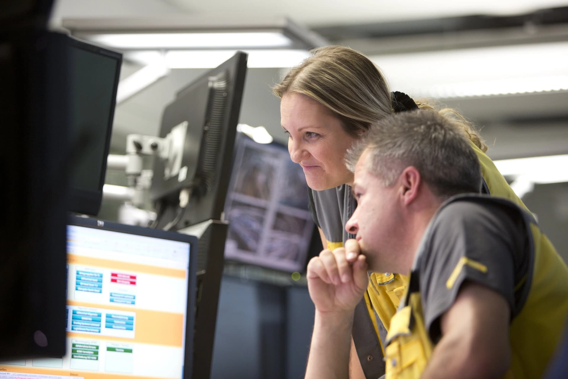 people working on hub booster software