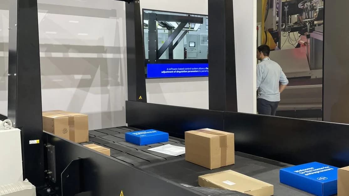 Boxes on a Visicon Compact in a warehouse setting.