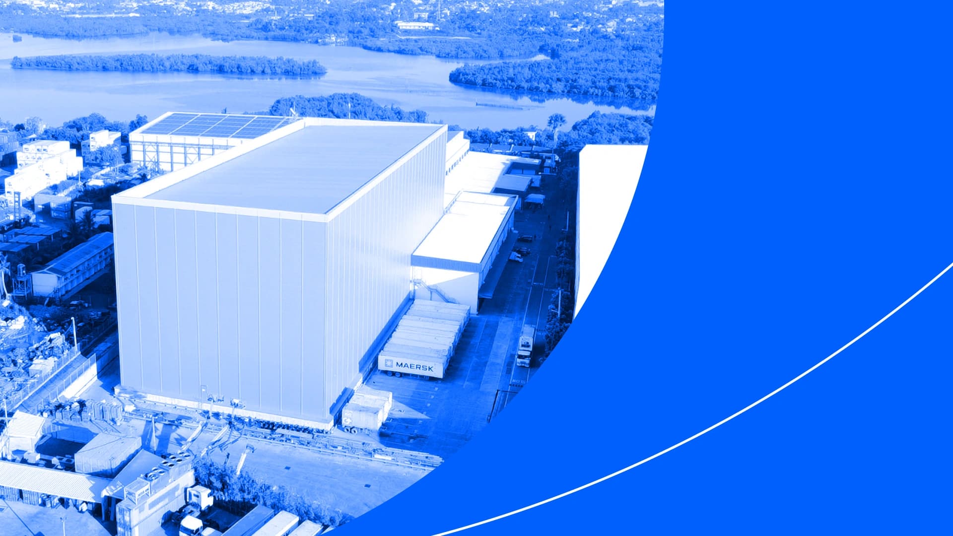 Blue background with a photo of a warehouse.