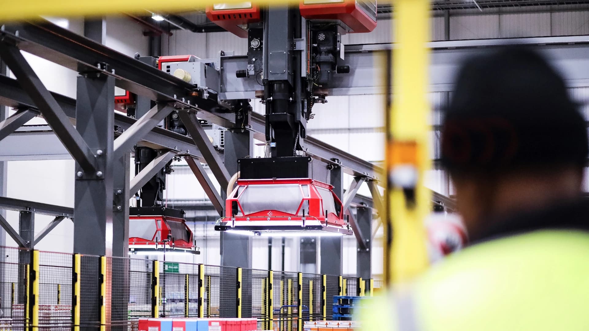 a men working on an automated warehouse environment