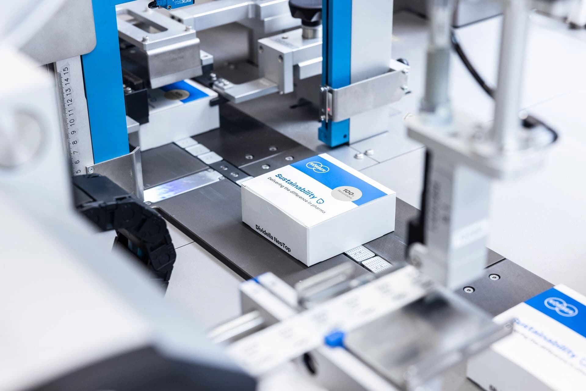 Package being assembled in a machine.