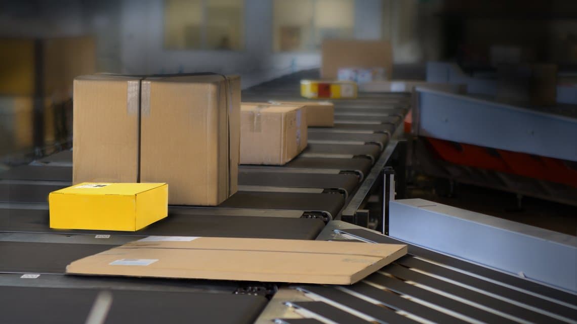 a bunch of parcels on a conveyor