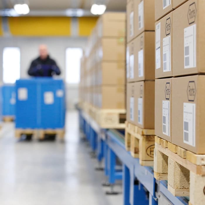 a man working in Roche's warehouse