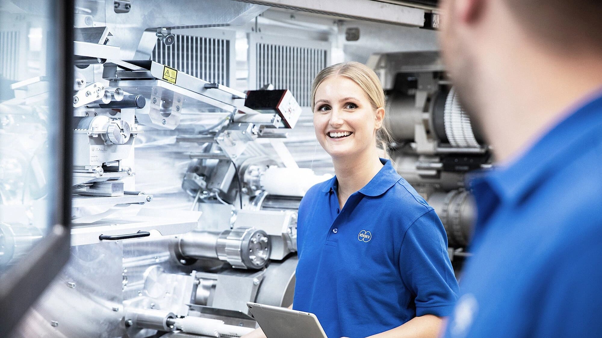 a Körber employee smiling