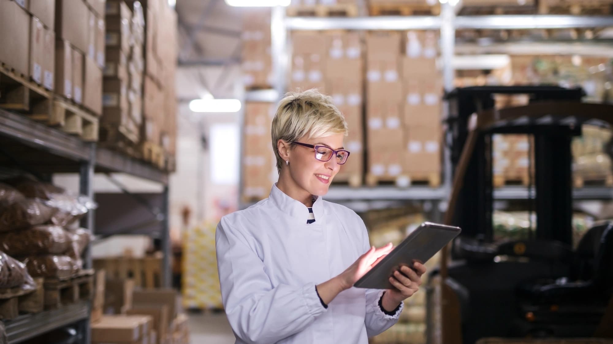 a woman working on a high-volume warehouse